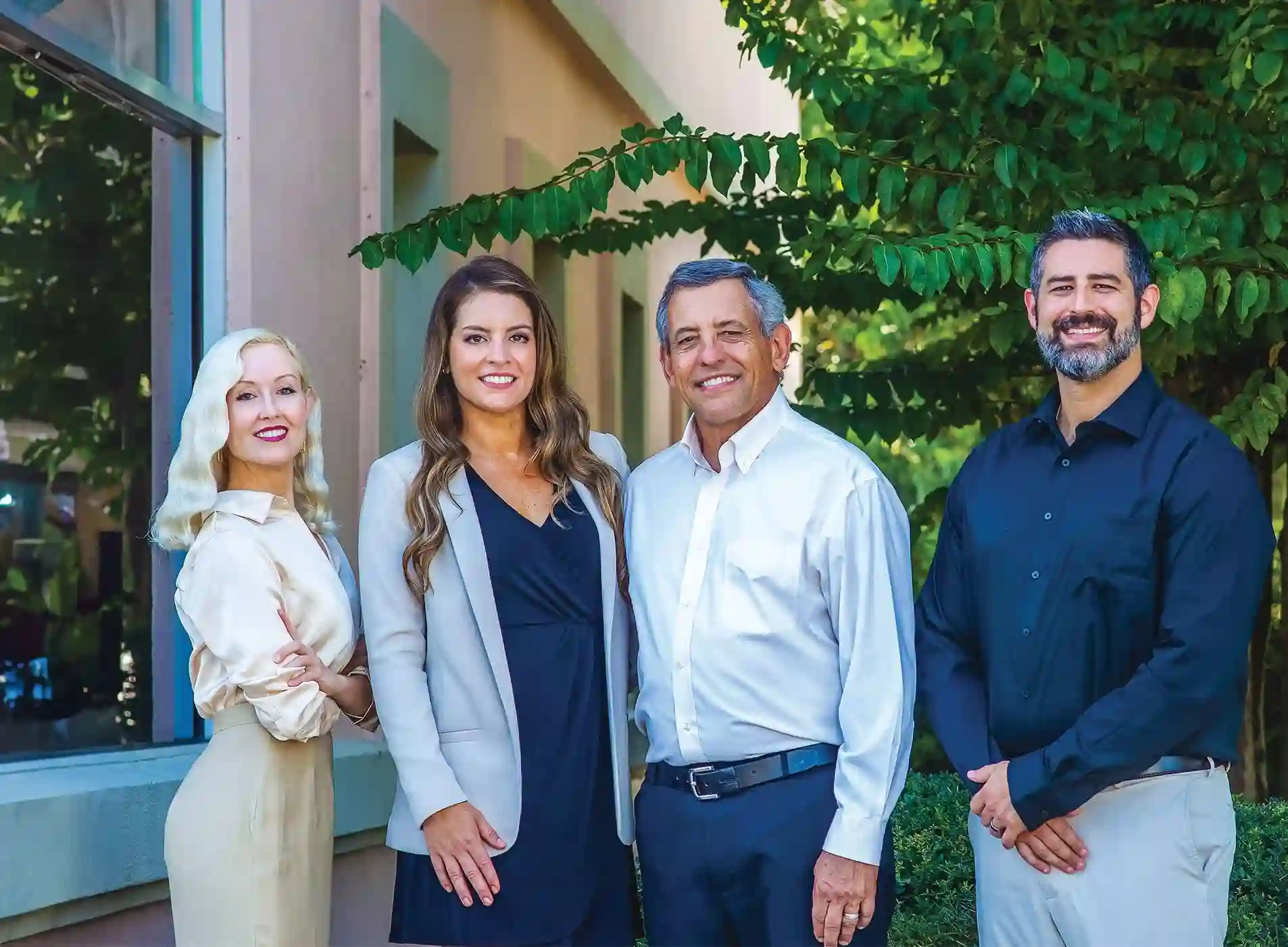 Amelia Gentle Dentistry team standing outside the Fernandina Beach dental office